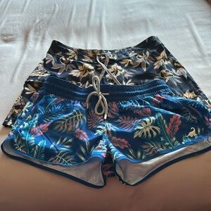 Set of two board shorts. Both women’s size 4. Both are new without sale tags.